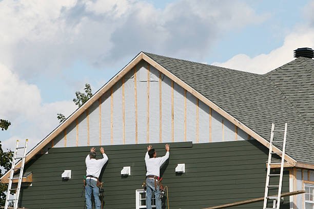 Professional Siding Installation technician working in Capron, VA